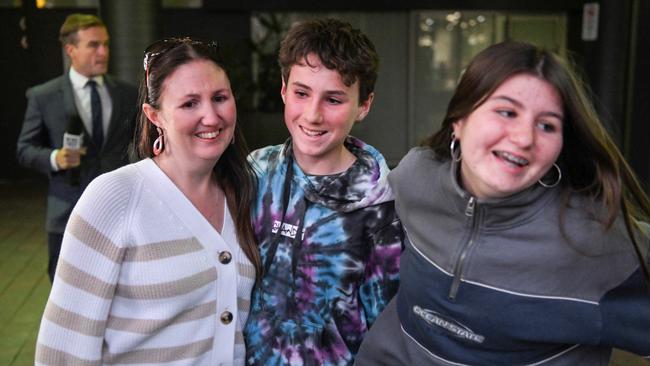 Tania Reckwell and her daughter Madison greets her son Zac after he was locked in the Westfield Marion. Picture: NewsWire / Brenton Edwards