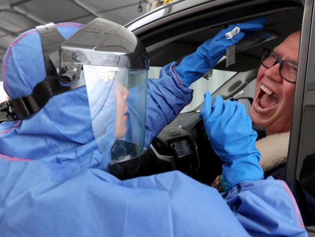 FIFO workers are screened for COVID-19 at a drive through Mineral Resources testing facility in Perth. Picture: AAP