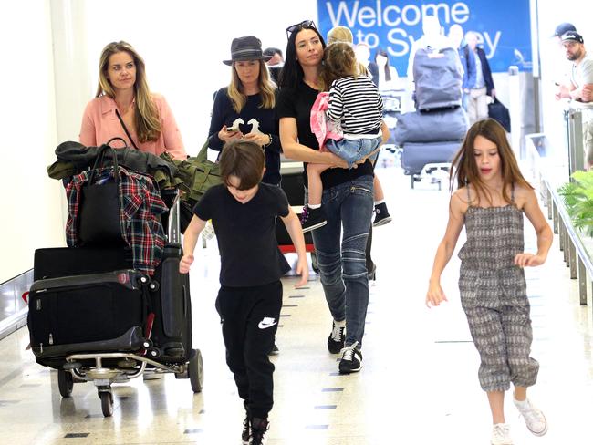 Erica Packer with children Jackson, Indigo and Emmanuelle returning home for the holidays. Picture: Dimex