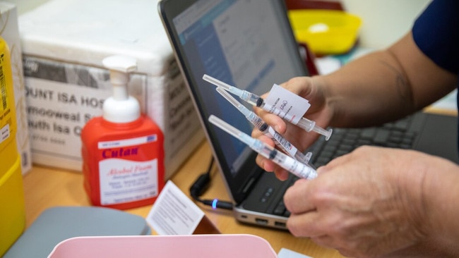 Vaccines being doubled checked prior to administering. Photo: DDH