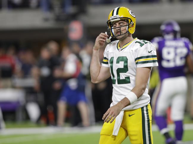 MINNEAPOLIS, MN - SEPTEMBER 18: Aaron Rodgers #12 of the Green Bay Packers reacts on the field in the first half of the game against the Minnesota Vikings on September 18, 2016 at US Bank Stadium in Minneapolis, Minnesota. Jamie Squire/Getty Images/AFP == FOR NEWSPAPERS, INTERNET, TELCOS & TELEVISION USE ONLY ==