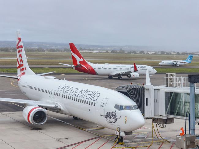 ADELAIDE, AUSTRALIA - NewsWire Photos SEPTEMBER 22, 2021: Virgin, Qantas and Cobham aircraft at Adelaide Airport. Picture: NCA NewsWire /Brenton Edwards