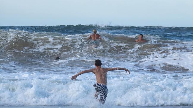 Ex-tropical cyclone Gabrielle whipped up some hazardous conditions at the normally safe Mooloolaba Spit, which was closed on Sunday. Photo: Mark Furler