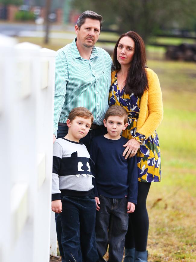 5 year old Myles Baldwin-Marshall, his 6 year old brother Max Baldwin-Marshall, Rebecca Baldwin, and Matthew Marshall on there property in Maraylya. The Outer Sydney Orbital corridor looks like it will go directly through their property. Picture: AAP Image / Angelo Velardo