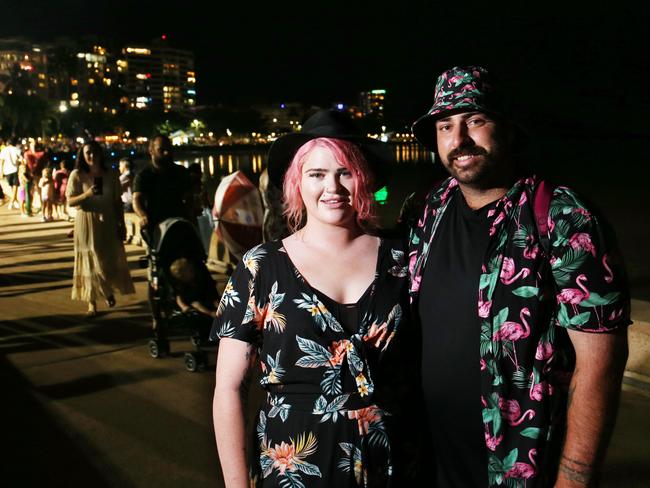 Ella Phelan and Joshua Dixon get ready to party on New Year's Eve on the Cairns Esplanade. Picture: Brendan Radke