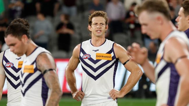 MELBOURNE, AUSTRALIA - MARCH 19: Nat Fyfe of the Dockers looks dejected after a loss during the 2023 AFL Round 01 match between the St Kilda Saints and the Fremantle Dockers at Marvel Stadium on March 19, 2023 in Melbourne, Australia. (Photo by Michael Willson/AFL Photos via Getty Images)