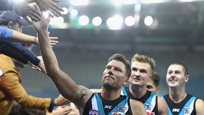 Brad Ebert of the Power high fives fans after Port’s 33-point win against North Melbourne. Picture: Quinn Rooney/Getty Images                        <a capiid="a9a75d7f8d3b9a6db92573bf07abb229" class="capi-video">Jy Simpkin shows off some skill</a>