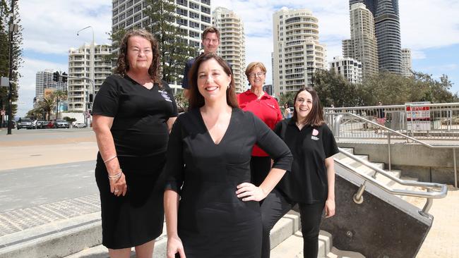 Schoolies boss Anna Hanson (front) with key Safer Schoolies partners (L-R): Chill Out Zone coordinator Angela Driscoll, RACQ Dave Webber, Rosie’s Friends on the Street boss Jayne Shallcross, and Alexandra Davis from Drug ARM. Picture: Glenn Hampson.