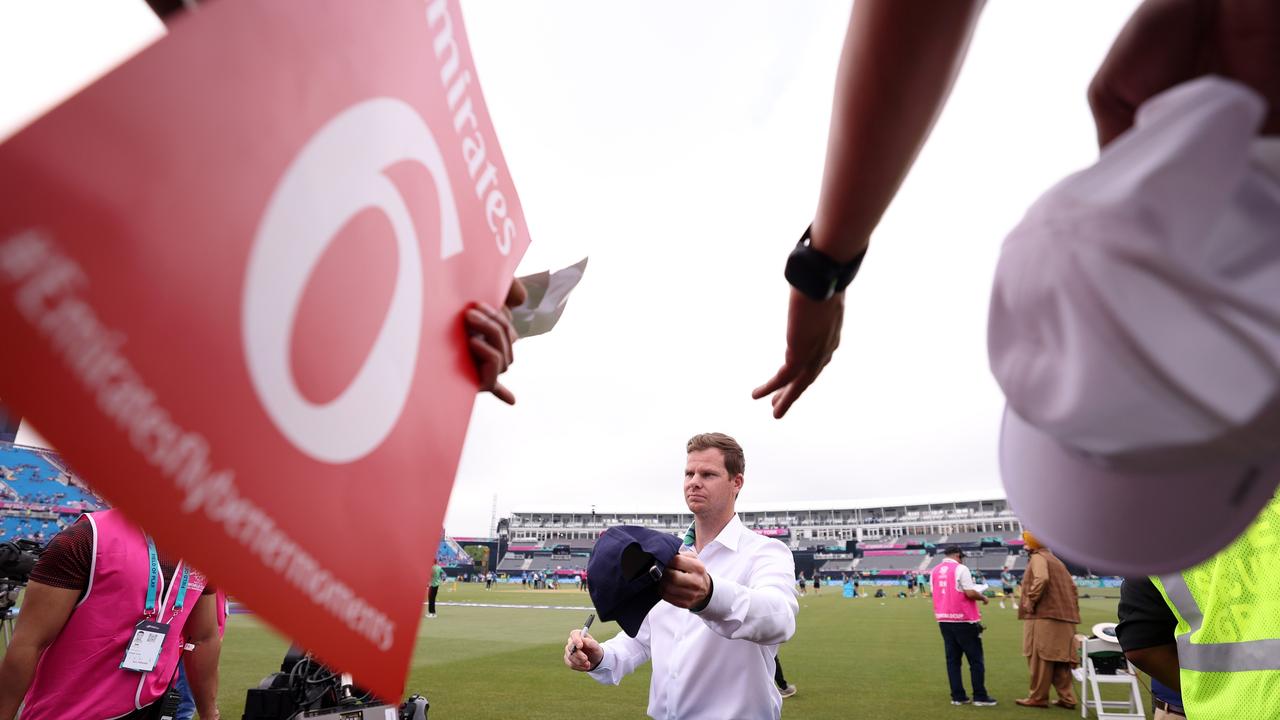 Steve Smith signs an autograph for fans in New York. Photo by Robert Cianflone/Getty Images