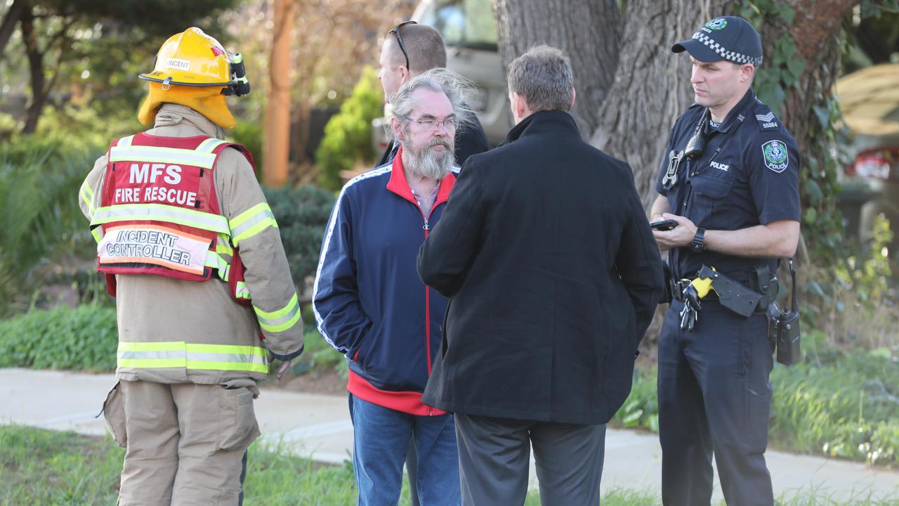 Mr Paget speaks to investigators at the scene. Picture: AAP / Dean Martin