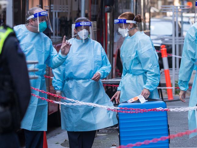 MELBOURNE, AUSTRALIA - NewsWire Photos APRIL 8, 2021: International travellers arrived at the Intercontinental Hotel in Melbourne to complete 2 weeks of quarantine. Victoria's quarantine program resumed today. Picture: NCA NewsWire / Paul Jeffers