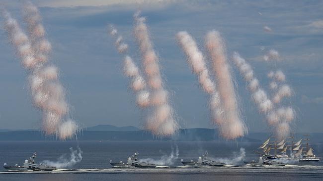 Russia's Pacific Fleet warships parade off the port city of Vladivostok during Navy Day celebrations. Picture: Pavel Korolyov/AFP