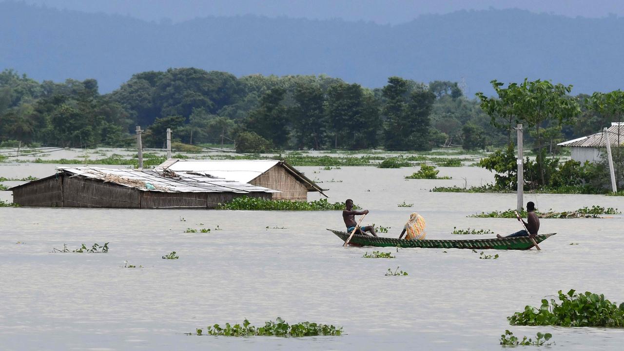 Villagers travel on a boat at Gagalmari village in the Morigaon district of Assam state on July 14, 2020. Picture: Biju Boro/AFP