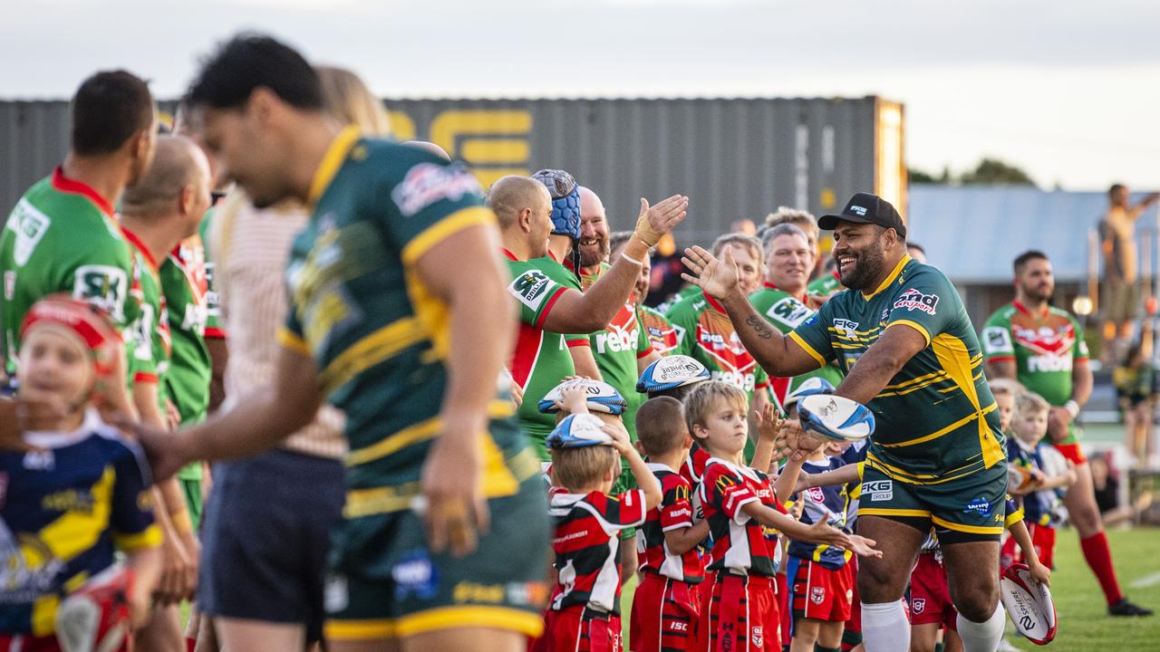 Sam Thaiday greets the Danes Allstars players.