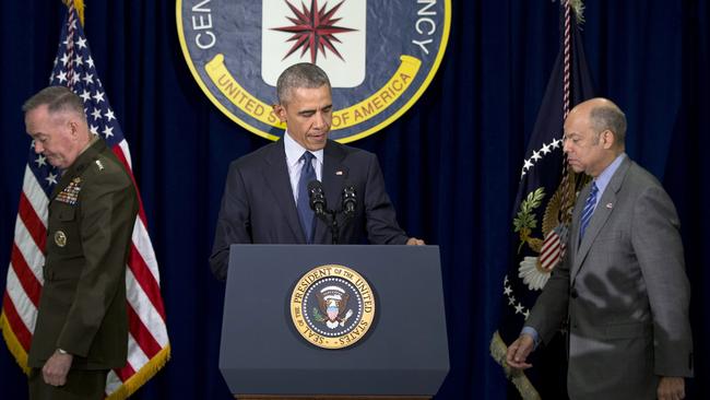 President Barack Obama arrives with Joint Chiefs Chairman Gen. Joseph Dunford, left, and Homeland Security Secretary Jeh Johnson right to speak at the CIA Headquarters in Langley, Va., Wednesday, April 13, 2016, after a meeting with his National Security Council. Obama pays a rare visit to CIA headquarters as the United States weighs sending more forces to Iraq to fight the Islamic State group. (AP Photo/Carolyn Kaster)