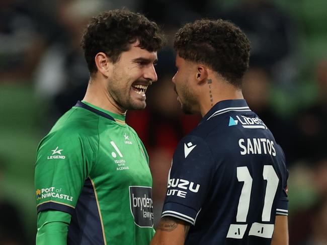 MELBOURNE, AUSTRALIA - MAY 04: Ryan Scott of the Jets and Santos Rodrigues of the Victory exchange words during the round 29 A-League Men match between Melbourne Victory and Newcastle Jets at AAMI Park, on May 04, 2025, in Melbourne, Australia. (Photo by Robert Cianflone/Getty Images)