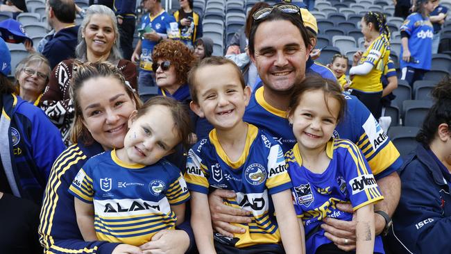 Alynta and Marc Foster with their children Pippa, Xander and Rori turned out to support the Eels after their defeat to the Panthers. Picture: Richard Dobson