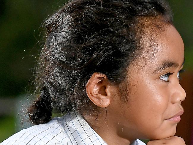 Cyrus Taniela, 5, is due to have his hair cutting ceremony, which is part of his father’s Cook Islands and Niuean heritage, when he’s seven. (AAP image, John Gass)