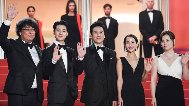 Director Bong Joon-Ho (from left) with actors Choi Woo-shik, Lee Sun-kyun, Cho Yeo-jeong and Chang Hyae-jin. Picture Loic Venance / AFP