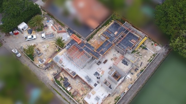 Aerial view of a mega-mansion at Mont Albert restrained by police.