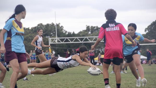 Rhani Hagan going over for a try.