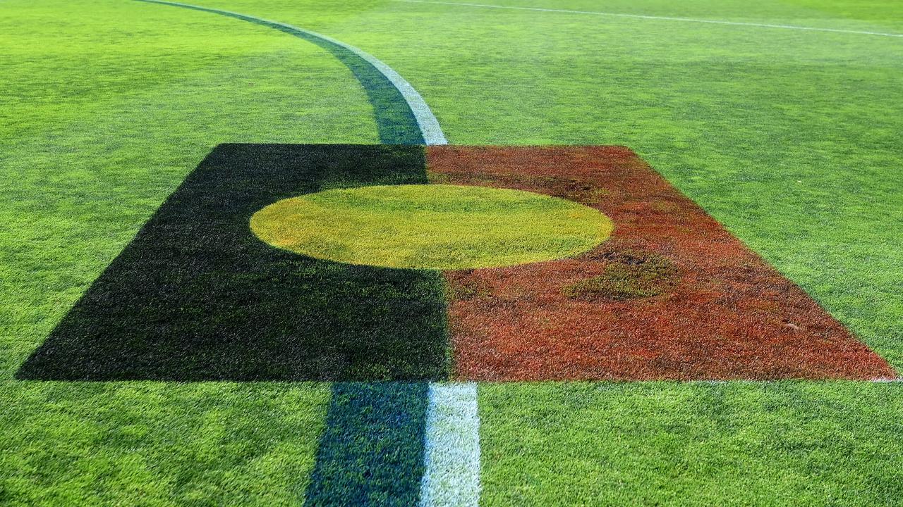 MELBOURNE, AUSTRALIA – SEPTEMBER 11: The indigenous flag is seen on the 50m line during the round three AFLW match between the Richmond Tigers and the Hawthorn Hawks at Punt Road Oval on September 11, 2022 in Melbourne, Australia. (Photo by Quinn Rooney/Getty Images)