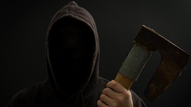 A man wielding an axe allegedly attacked the owner of a home he was trying to rob in Langwarrin.