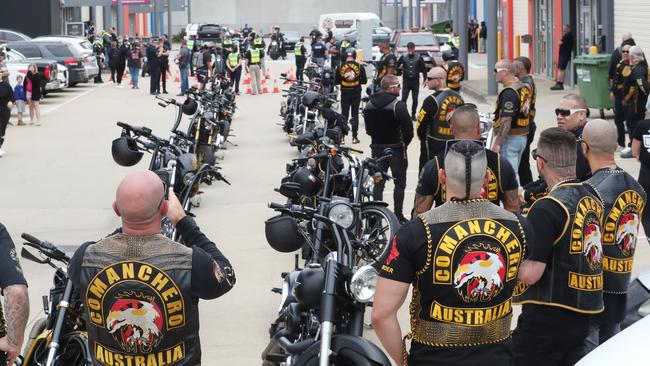 Comanchero watched by police leave for their OMCG run. Picture: David Crosling