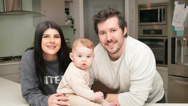 Kevin and Tayla Coates and their son, 9-month-old Kieran, inside their Greenwith home. Picture: Dean Martin