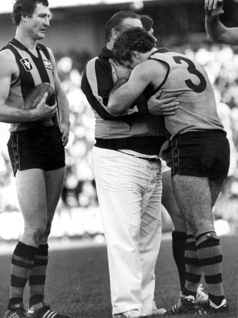 Leigh Matthews in the hands of a trainer.