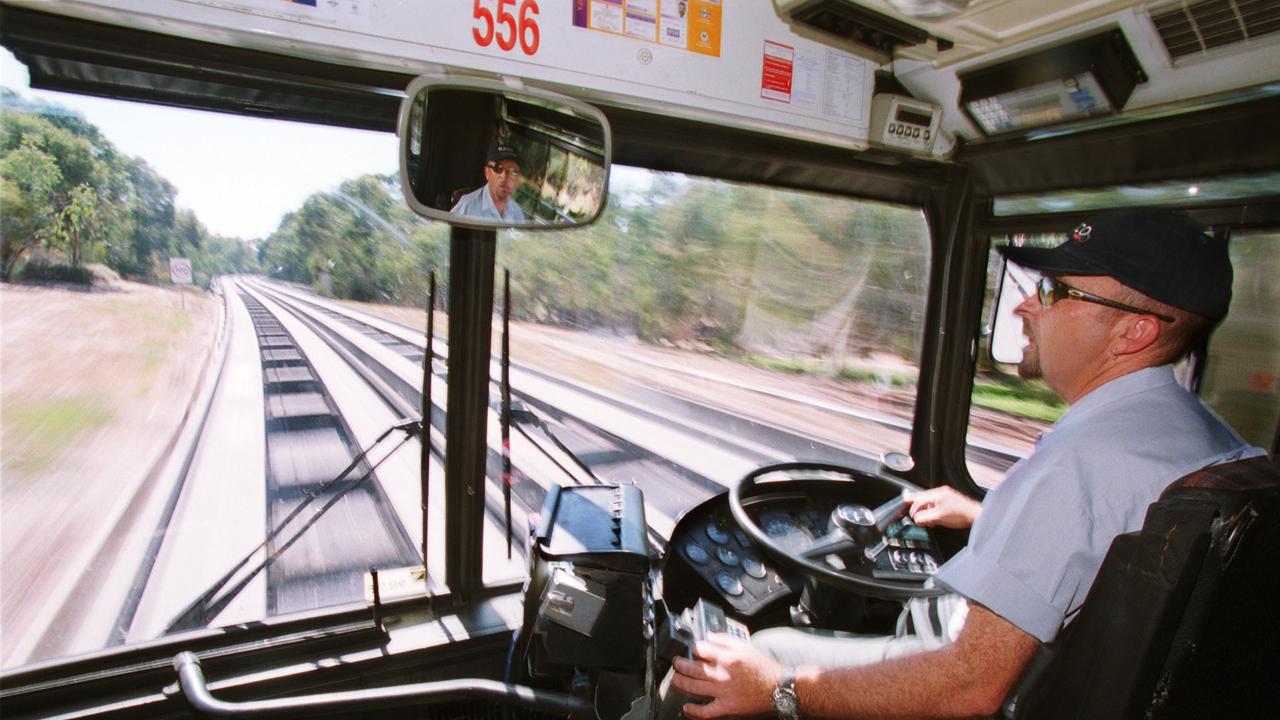 Bus driver Stephen Light driving his O-Bahn bus in 2001. Picture: Dean Martin