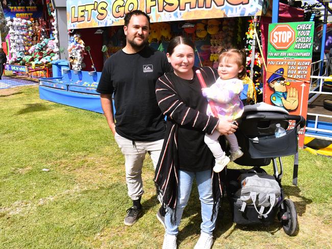 Attendees enjoying the 159th Sale Agricultural Show at the Sale Showgrounds on Friday, November 01, 2024: James Warren, Carina Warren and Mylah. Picture: Jack Colantuono