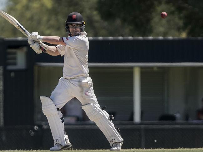 Aaron Ayre carves a cut shot through backward point during his hundred. Picture: Valeriu Campan