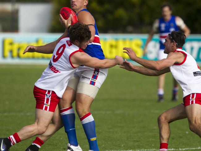 Peninsula FL: Karingal v Mornington at Frankston Oval.Jake Kelly and Damian Ashcroft from KaringalMichael Gay from Mornington BulldogsPicture: Richard Serong