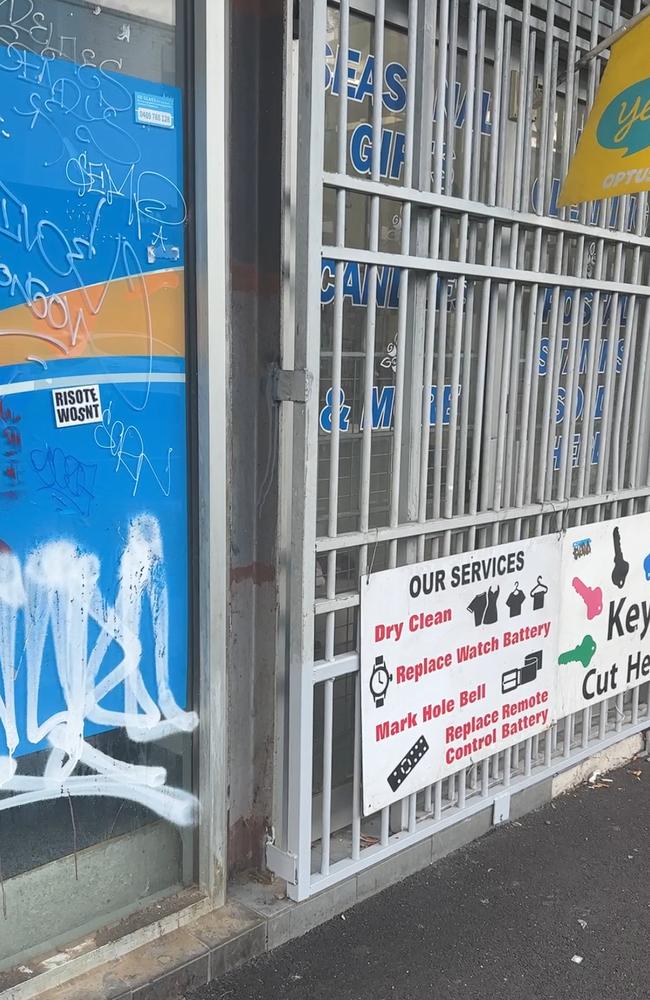 Businesses are installing metal bars across windows to stop vandals from breaking in.