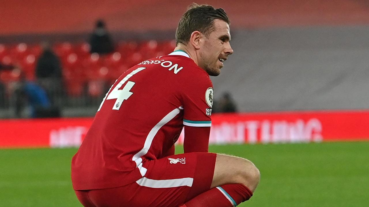 Liverpool's Jordan Henderson wrote on behalf of the playing group. (Photo by Paul ELLIS / POOL / AFP)