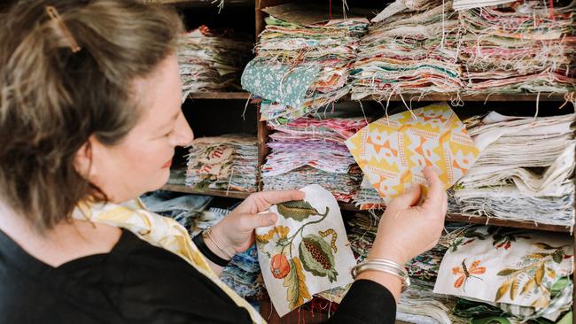 Sarah Stamm of Salisbury and Maude with her new quilt designs.