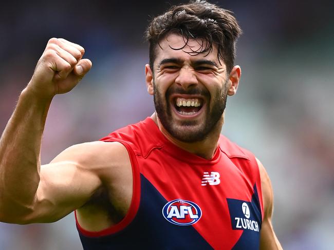 MELBOURNE, AUSTRALIA - MARCH 20: Christian Petracca of the Demons celebrates kicking a goal during the round one AFL match between the Melbourne Demons and the Fremantle Dockers at Melbourne Cricket Ground on March 20, 2021 in Melbourne, Australia. (Photo by Quinn Rooney/Getty Images)