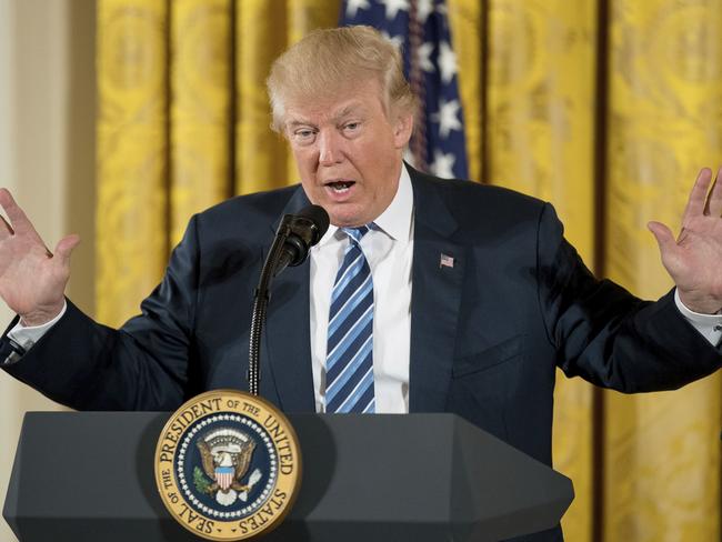 President Donald Trump speaks during a White House senior staff swearing in ceremony in the East Room of the White House, Sunday, Jan. 22, 2017, in Washington. (AP Photo/Andrew Harnik)