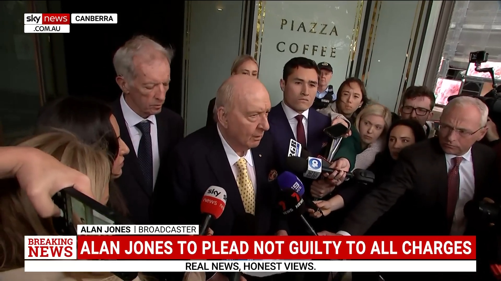 Alan Jones speaks to media outside court