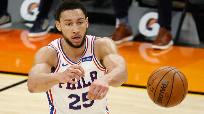 (FILES) In this file photo taken on February 13, 2021, Ben Simmons of the Philadelphia 76ers passes the ball during the first half of the NBA game against the Phoenix Suns at Phoenix Suns Arena in Phoenix, Arizona. NOTE TO USER: User expressly acknowledges and agrees that, by downloading and or using this photograph, User is consenting to the terms and conditions of the Getty Images License Agreement.   Christian Petersen/Getty Images/AFP - Simmons was hit with a one-game suspension by the team on October 19, 2021, ruling him out of the club's season opener against New Orleans. A Sixers statement said Simmons would miss the October 20 game against the Pelicans for 