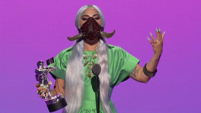 Lady Gaga opted for a horned mask while accepting the award for Song of the Year award. Picture: MTV / AFP