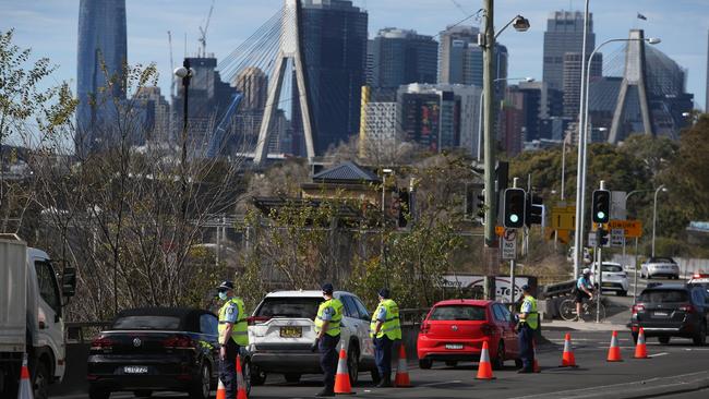 NSW Police conduct roadside checks along the M4 leading towards Anzac Bridge. Picture: Lisa Maree Williams/Getty