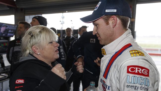 Erebus Motorsport owner Betty Klimenko chats with driver Dave Reynolds.