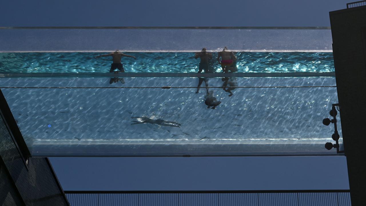 People swimming in the sky pool. Picture: Justin Tallis/AFP