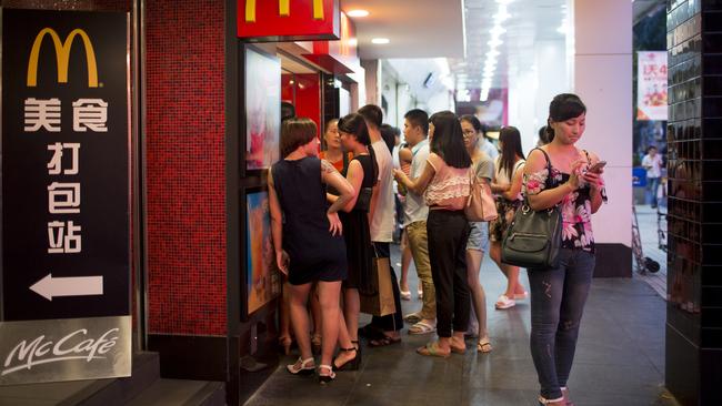 Customers at a McDonald’s in Shenzhen. Photographer: Brent Lewin/Bloomberg