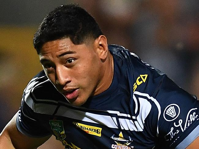 TOWNSVILLE, AUSTRALIA - APRIL 21:  Jason Taumalolo of the Cowboys makes a break on his way to score a try during the round seven NRL match between the North Queensland Cowboys and the Gold Coast Titans at 1300SMILES Stadium on April 21, 2018 in Townsville, Australia.  (Photo by Ian Hitchcock/Getty Images)