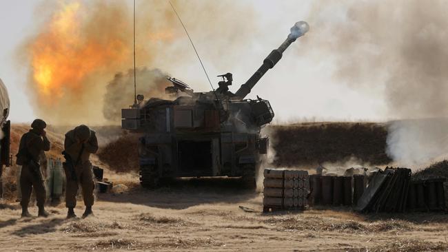 Israeli gunners fire a 155mm self-propelled howitzer towards targets in the Gaza Strip from near the southern city of Sderot on Wednesday. Picture: AFP