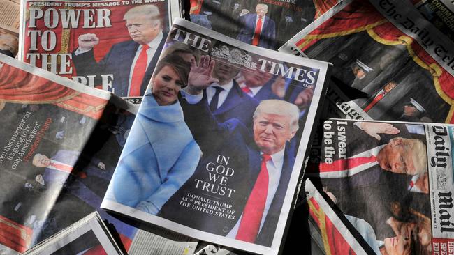 A selection of daily newspapers in the UK showing coverage of US President Donald Trump's inauguration in Washington.