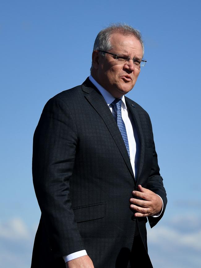 Prime Minister Scott Morrison will launch the HomeBuilder scheme which is designed to keep tradies in work for long periods of time. (AAP Image/Joel Carrett)